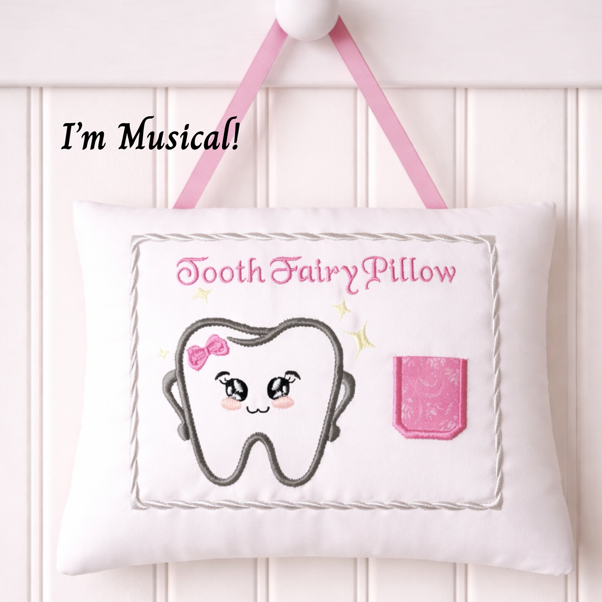 Musical Tooth Fairy Pillow with cartoon tooth design and pink pocket on a white background